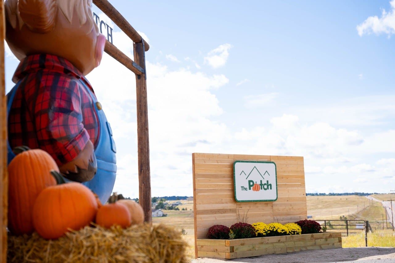 Dusty and Kathy Smith standing out on the farm on an open afternoon